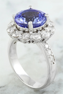Jewellers Club 1/4 กะรัต T.G.W. แหวนเงินสเตอร์ลิงแทนซาไนท์และเพชรสีขาว