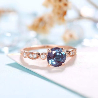 ดีไซน์ทันสมัยยอดนิยม Round Cut Rose Gold Plated Lab Alexanderite Jewelry White CZ Jewelry Ladies Ring