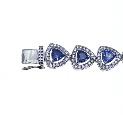 เครื่องประดับแฟชั่นเงินแท้ 925 Trillion Cut Tanzanite สร้อยข้อมือเทนนิส